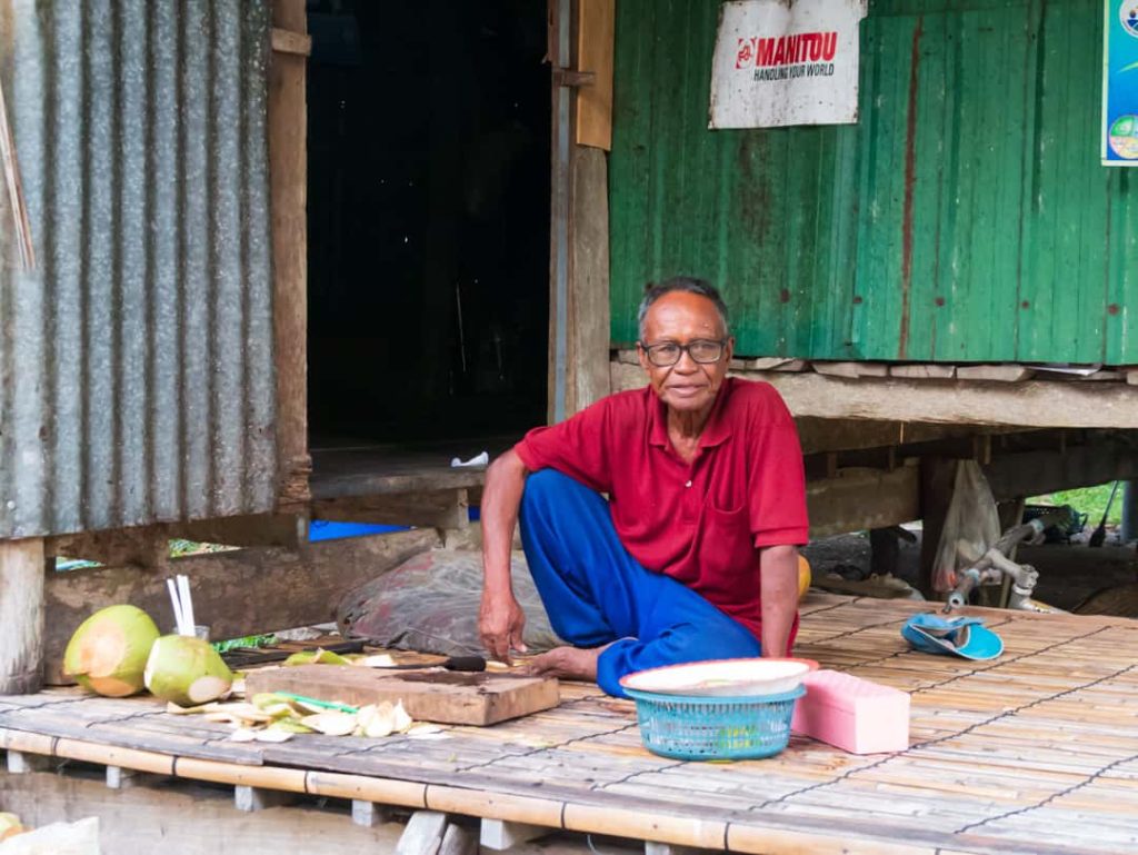 man at coconut farm